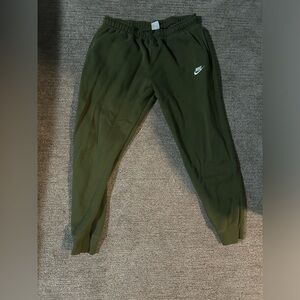 Green Nike joggers